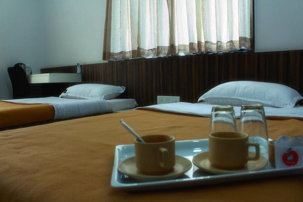 Aashiyana Inn Nashik Bagian luar foto